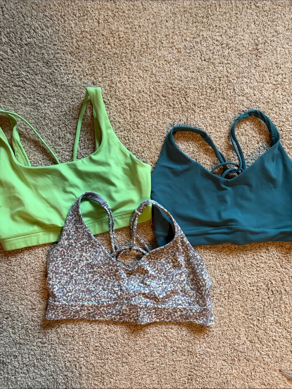 Athleta Strappy Sports Bras - Lime Green, Teal, and Speckled.
